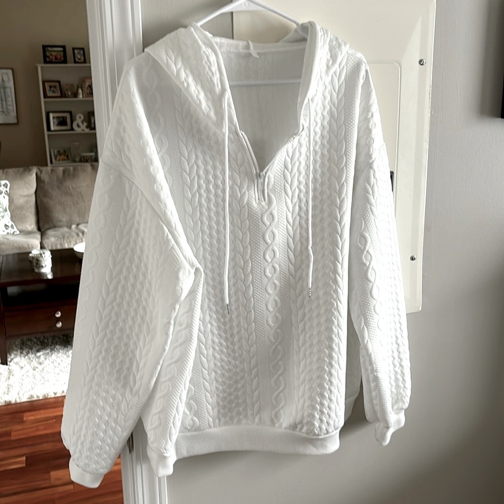 White sweater top.      Size tag has since been removed!